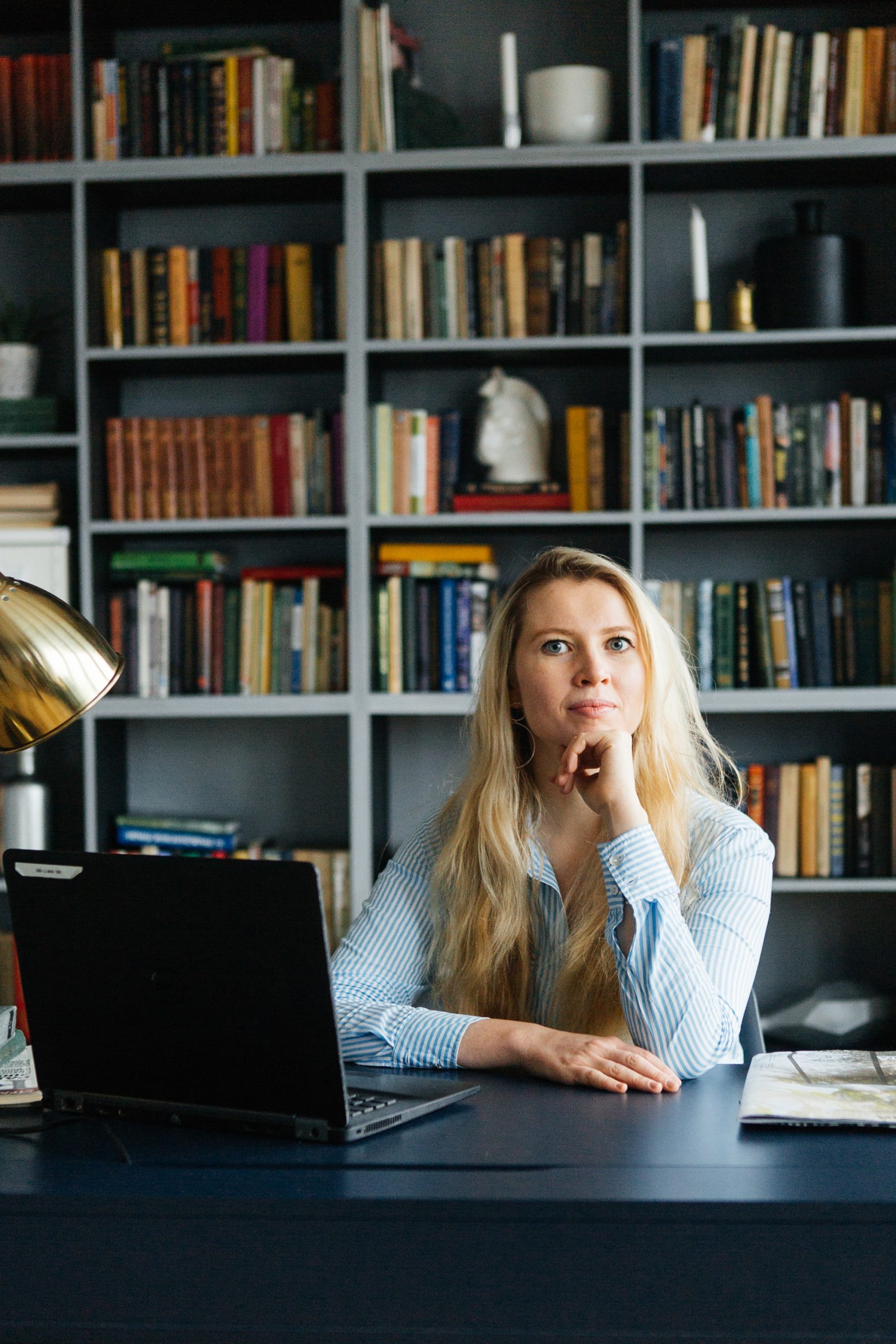 young woman working laptop table homework study education girl businesswoman 1 scaled